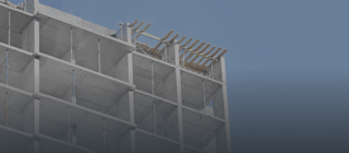 Uma estrutura de concreto de um prédio em construção. Vemos vários andares com colunas e lajes de concreto já formadas.